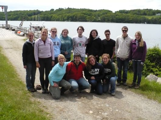 2012 REU students outside. Water in the background.