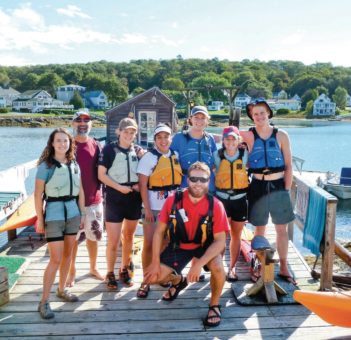 Dr. David Fields with students on a dock inBoothbay Harbor