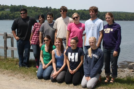 2011 REU students outside. Water in the background.