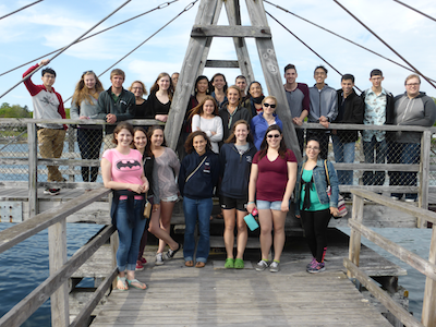 2016 REU students outside on dock.