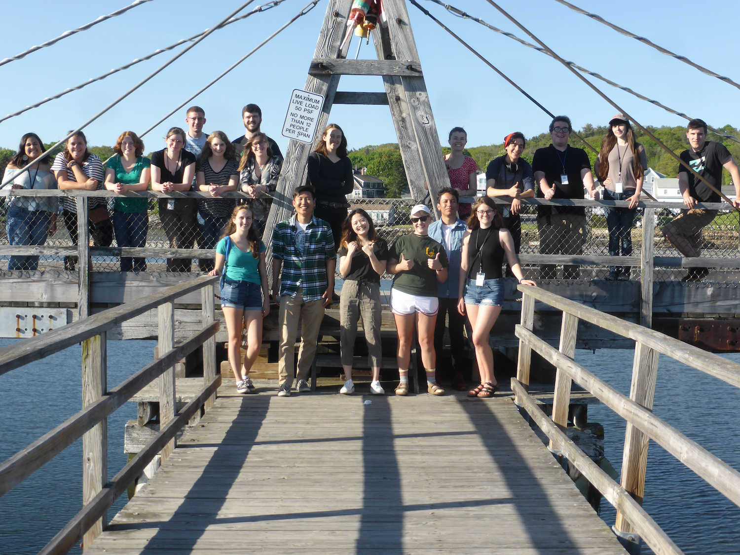 2018 REU students outside on dock.