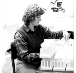 Dr. Maureen D. Keller in lab performing an experiment