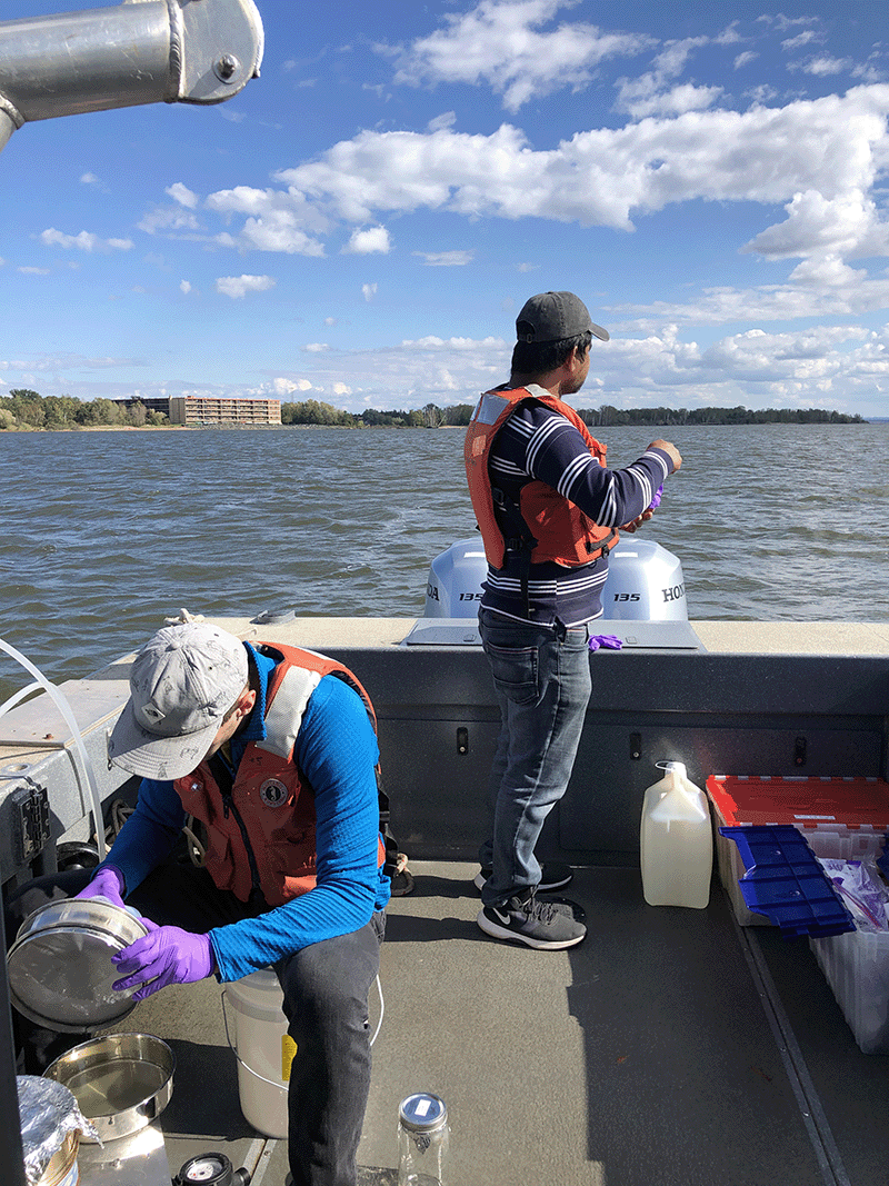 Sampling surface water in Lake Superior