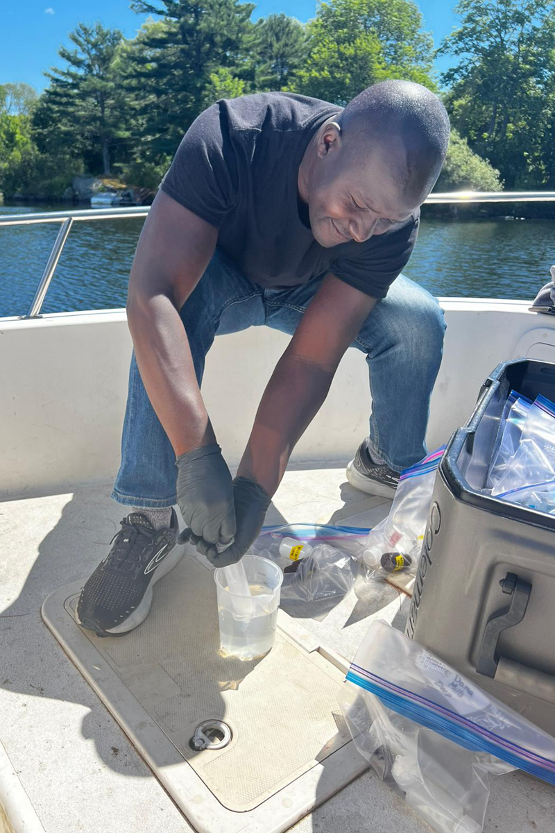 Preston Akenga, a researcher from Kisii University in Kenya, performing fieldwork in Maine