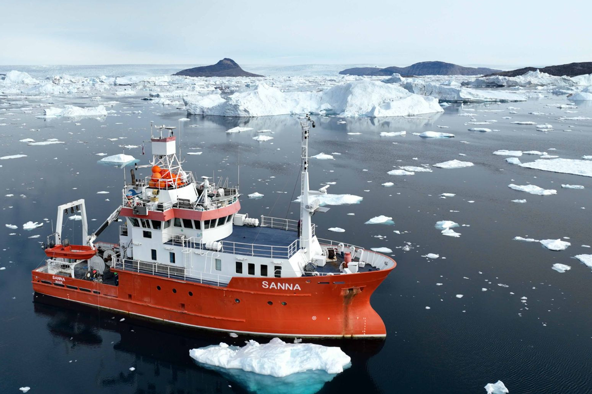 RV Sanna with Tuttulikassaap Sermia in the background during the recent expeditio by Aurora Roth
