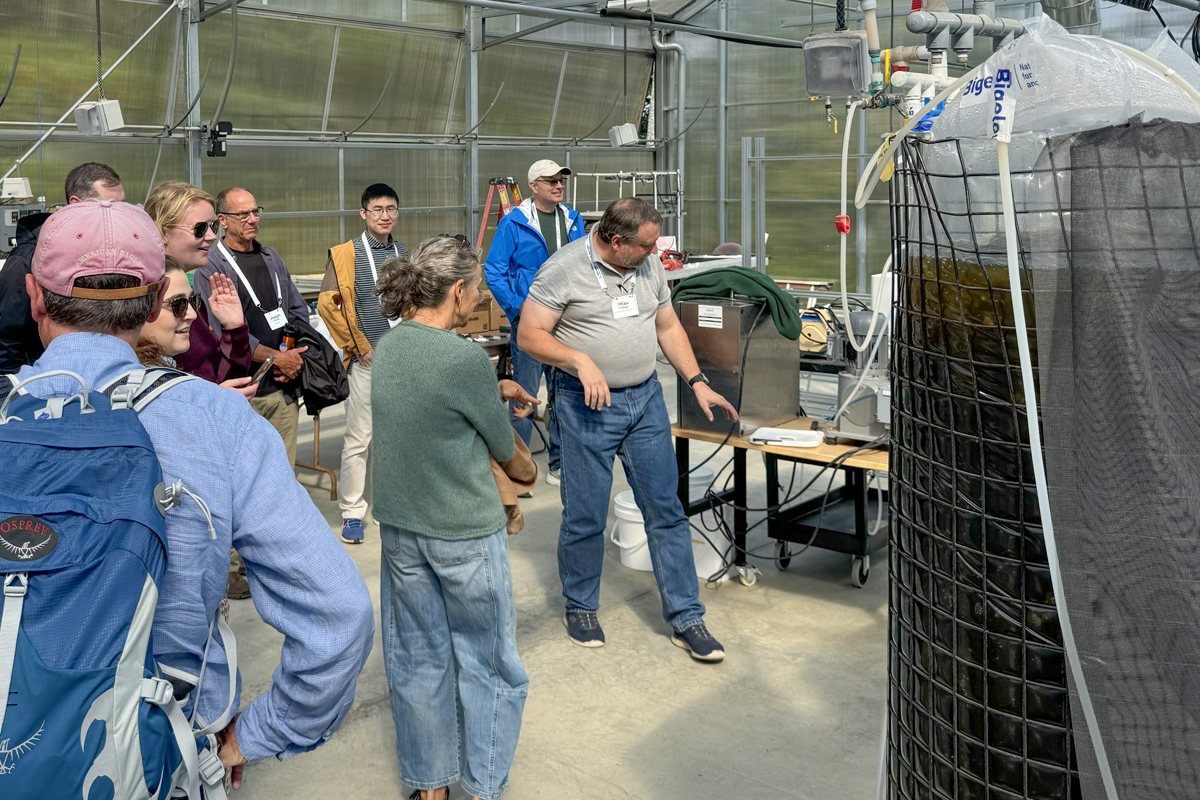 Senior Research Scientist Mike Lomas leads a tour of Bigelow Laboratory's greenhouse during a Maine Blue Economy Week field trip