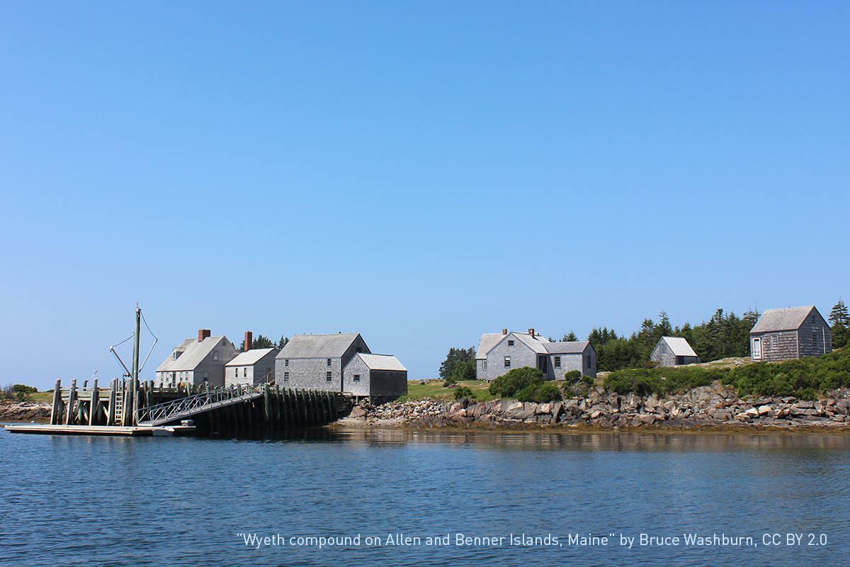 Low angle shot of a Maine cottage and gardens