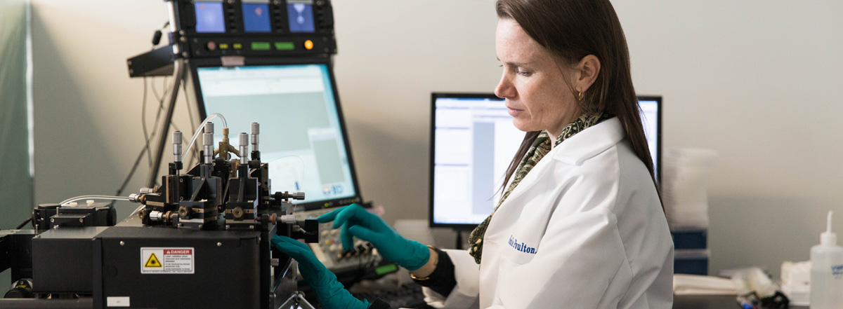 Senior Research Scientist Nichole Poulton Performing Flow Cytometry